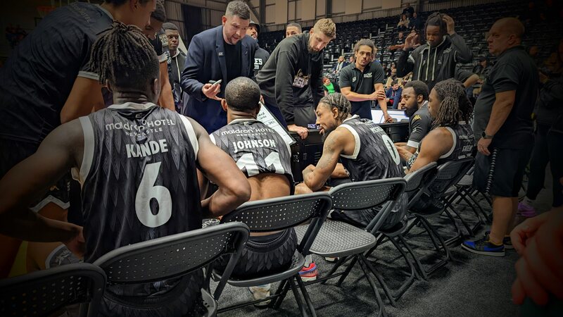 Newcastle Eagles coach Marc Steutel addresses the team