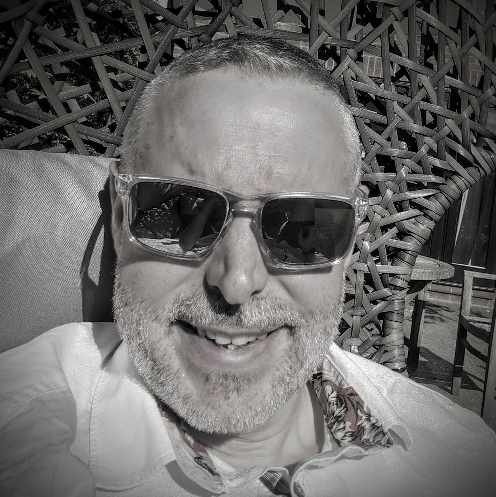 Doug reclining in a chair