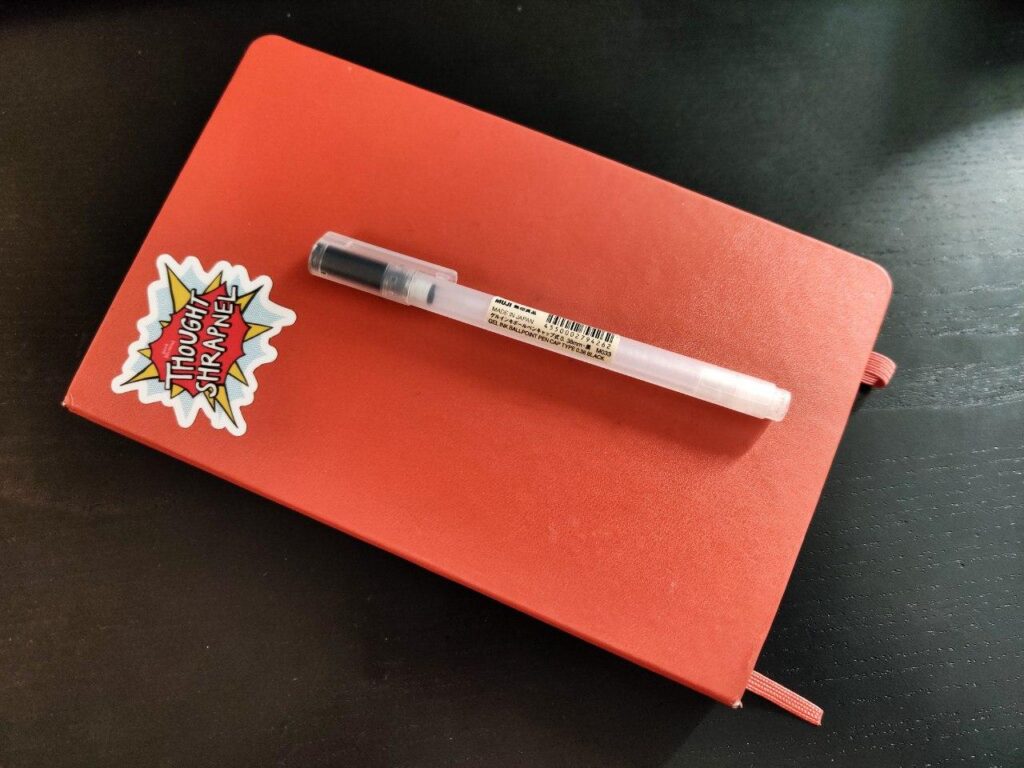 Notebook with pen