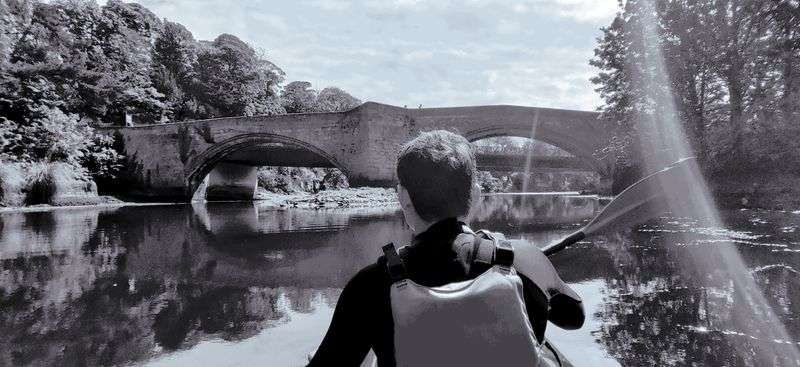 Paddling down the River Coquet
