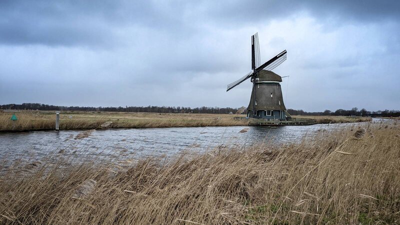 Windmill next to a canal